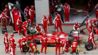 Ferrari driver Vettel leaves pits after tyre change during Austrian F1 Grand Prix in Spielberg