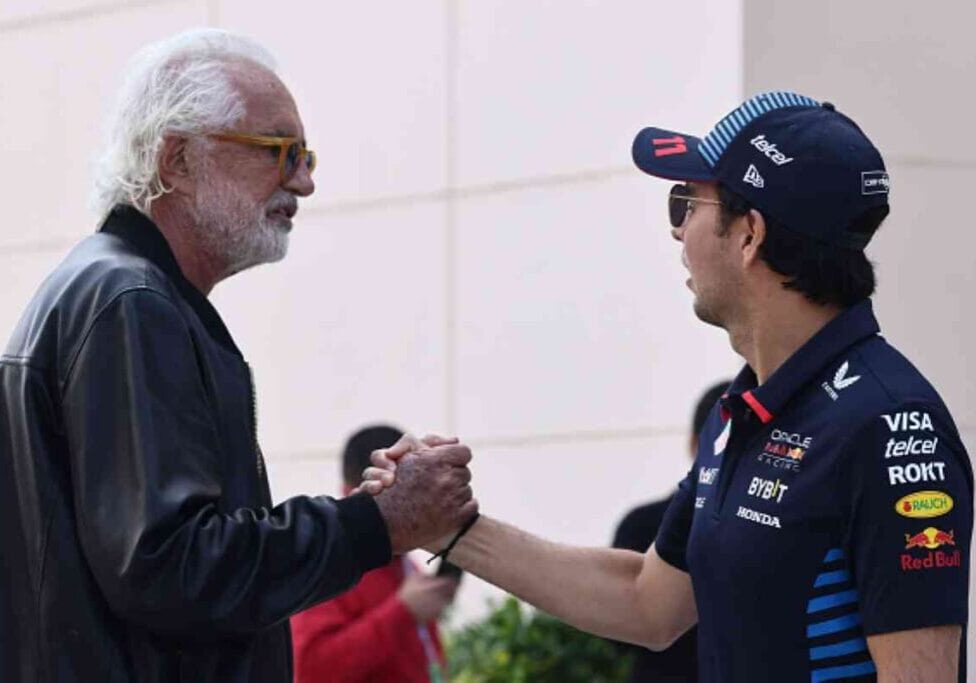 Flavio Briatiore and Sergio Perez of Red Bull Racing ahead of the Formula 1 Bahrain Grand Prix at Sakhir Circuit in Sakhir, Bahrain on March 2, 2024. (Photo by Jakub Porzycki/NurPhoto via Getty Images)
