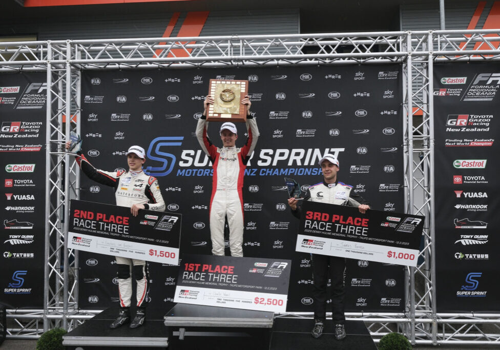 Picture_1_-_Champion_Wurz_is_flanked_by_runner_up_van_Hoepen_and_third_placed_Penrose