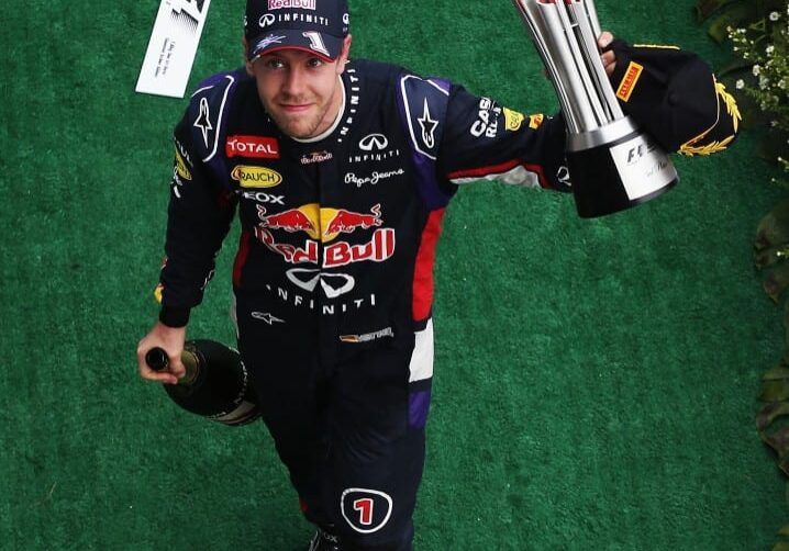 KUALA LUMPUR, MALAYSIA - MARCH 30:  Third placed Sebastian Vettel of Germany and Infiniti Red Bull Racing celebrates on the podium after the Malaysia Formula One Grand Prix at the Sepang Circuit on March 30, 2014 in Kuala Lumpur, Malaysia.  (Photo by Mark Thompson/Getty Images) *** Local Caption *** Sebastian Vettel