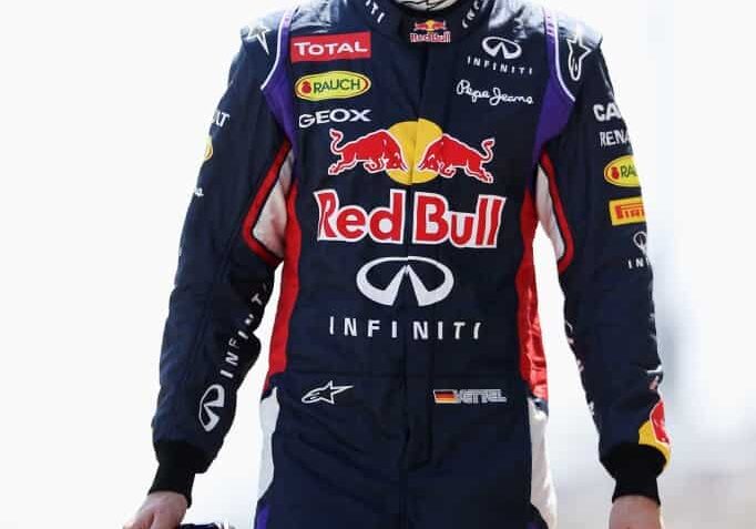 Sebastian Vettel of Germany and Infiniti Red Bull Racing poses for a photograph during day three of Formula One Winter Testing at the Bahrain International Circuit in Bahrain, Bahrain on March 1, 2014
