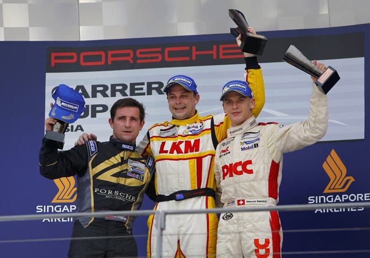 Podium and results:
1st Earl Bamber (NZL) LKM Racing Team, centre.
2nd Martin Ragginger (AUT) Team Porsche Holding, left.
3rd Alexandre Imperatori (HKG) PICC Team StarChase, right.
Porsche Carrera Cup Asia, Marina Bay Street Circuit, Singapore, 19-21 September 2014.