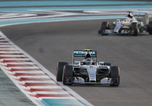 Mercedes driver Nico Rosberg of Germany leads his teammate Lewis Hamilton of Britain during the Emirates Formula One Grand Prix at the Yas Marina racetrack in Abu Dhabi, United Arab Emirates, Sunday, Nov. 29, 2015. (AP Photo/Frank Augstein)